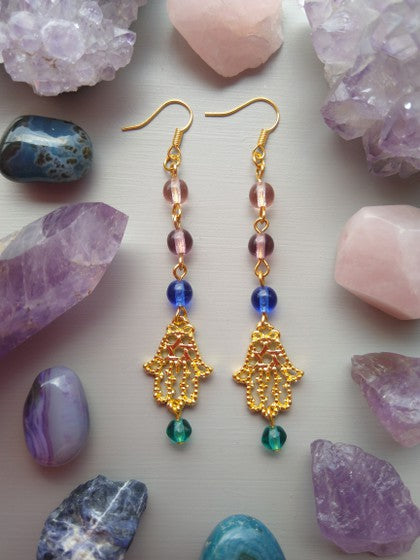 ARETES VERDE, AZUL Y MORADO CON HAMSA