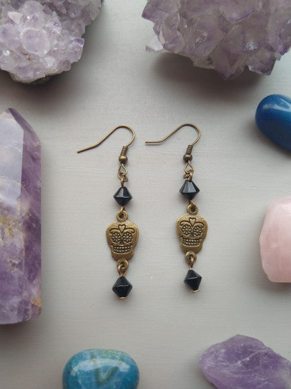 ARETES CALAVERITAS NEGROS