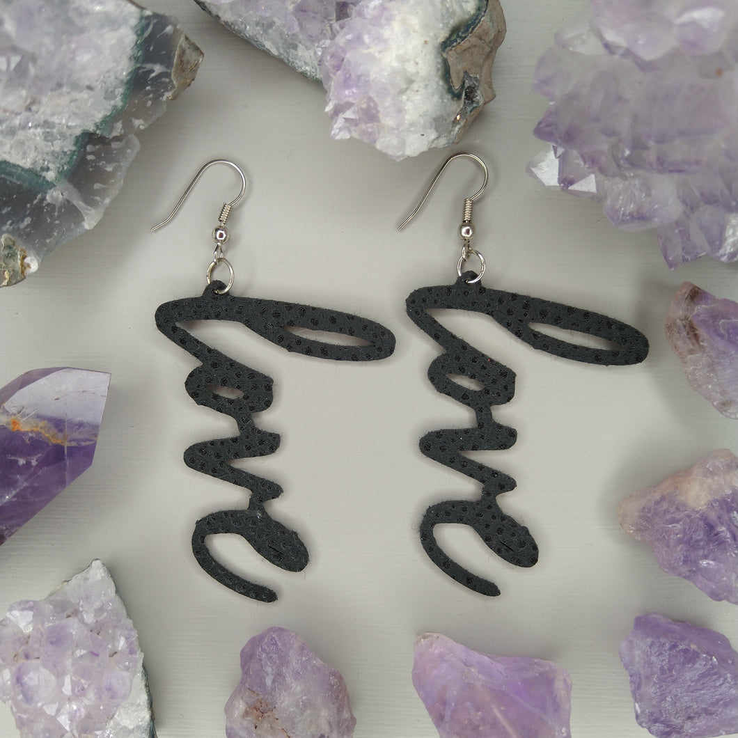 Aretes love negros