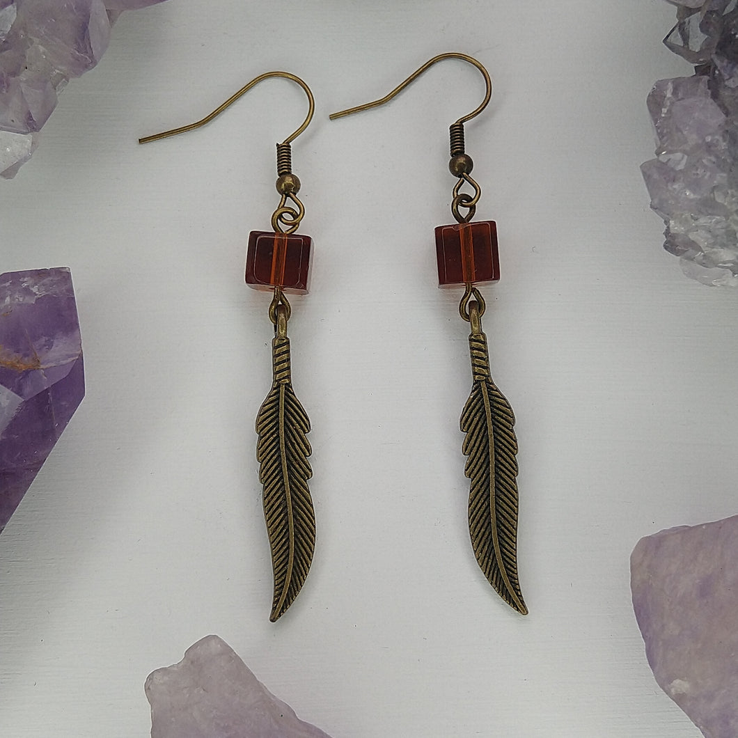 ARETES PLUMA CAFÉ