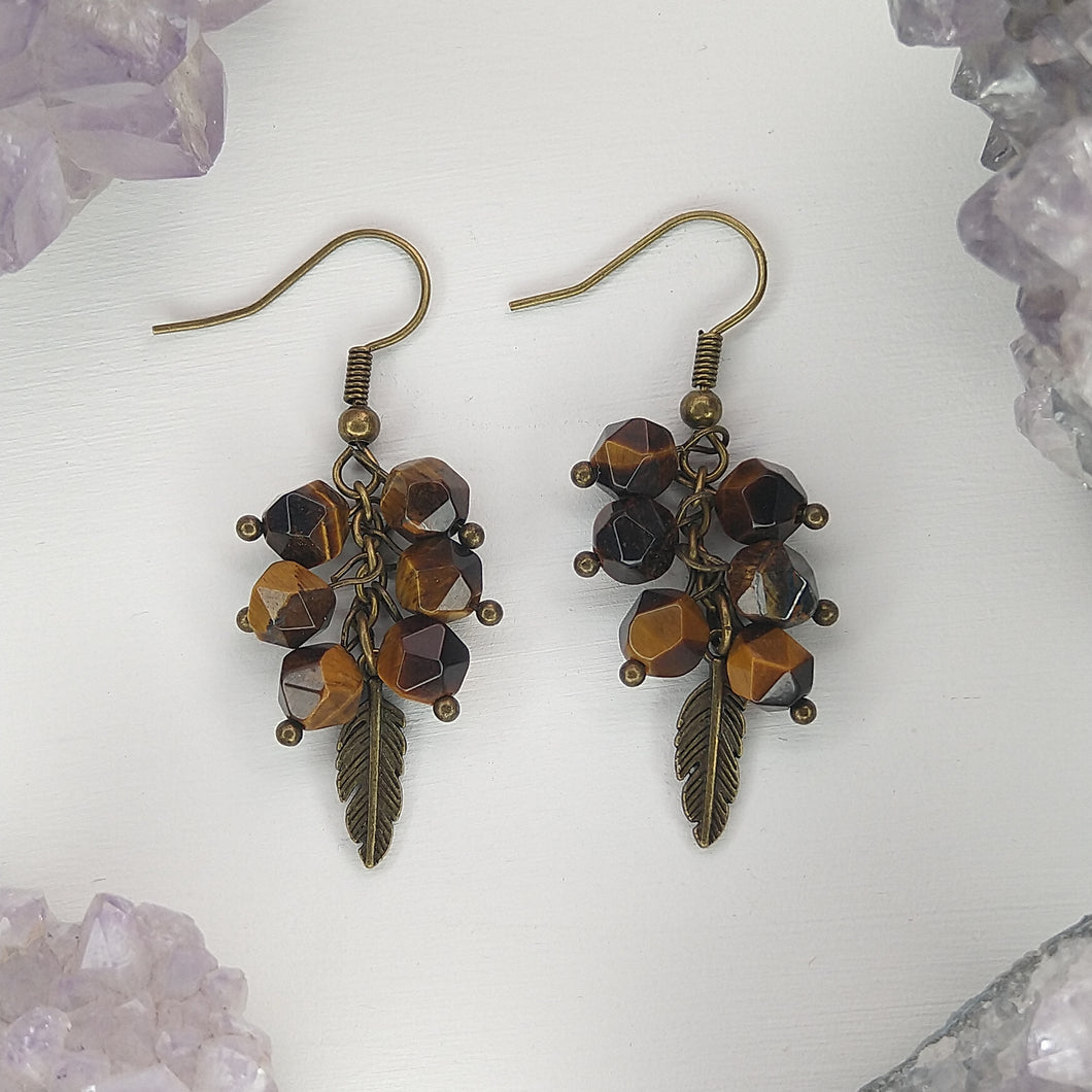 ARETES PLUMA MINI OJO DE TIGRE