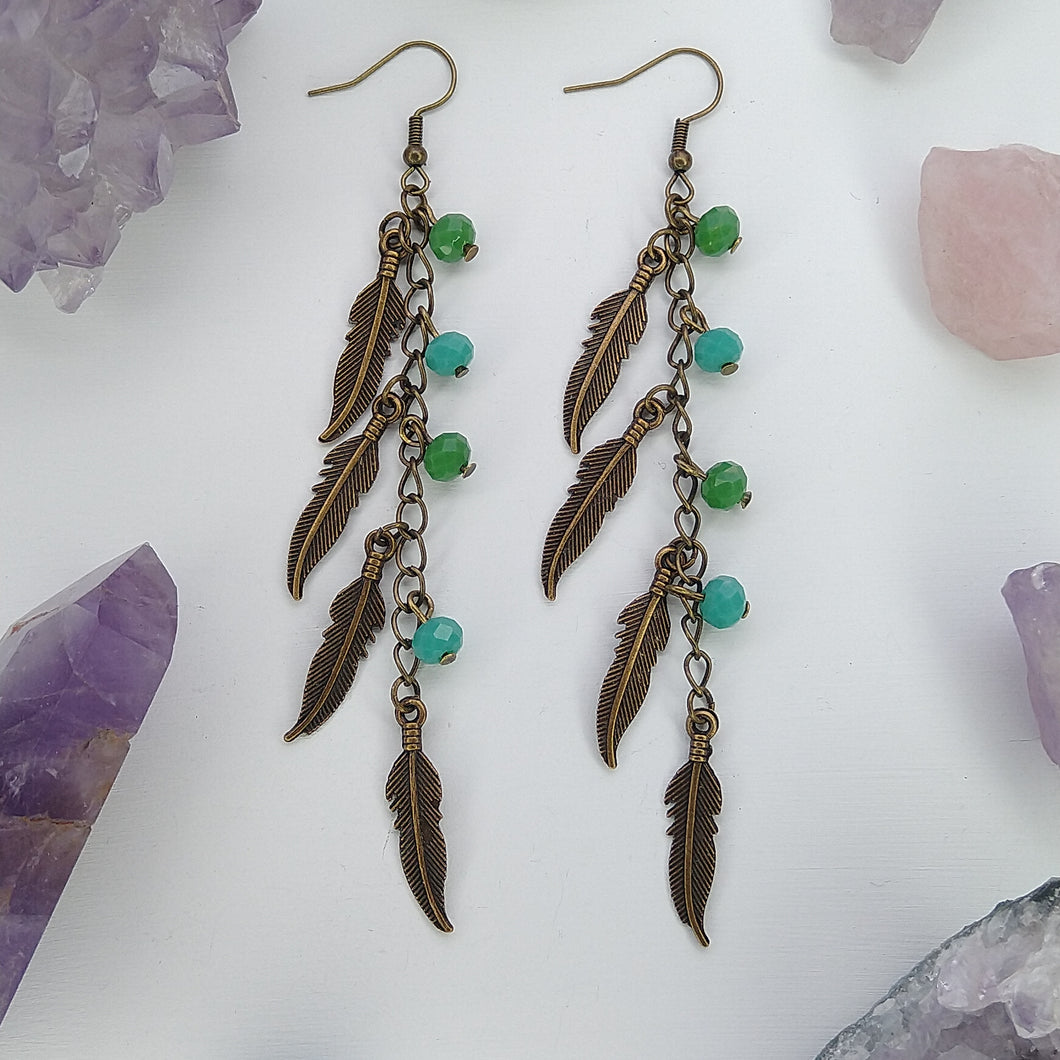 ARETES PLUMAS VERDES