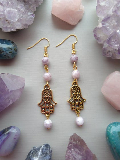 ARETES LILA HAMSA