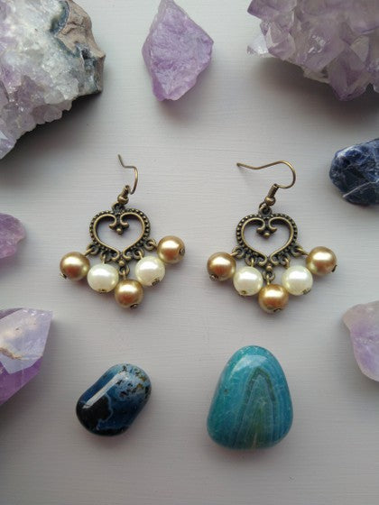 ARETES CANDELABRO PERLAS BEIGE Y DORADO