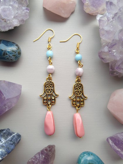 ARETES AZUL, LILA Y ROSA CON HAMSA