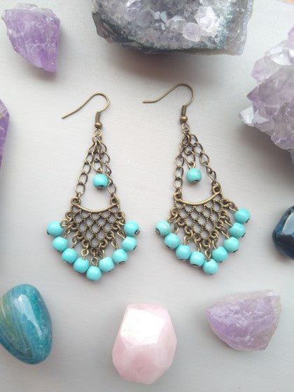 ARETES CANDELABRO HOWLITA