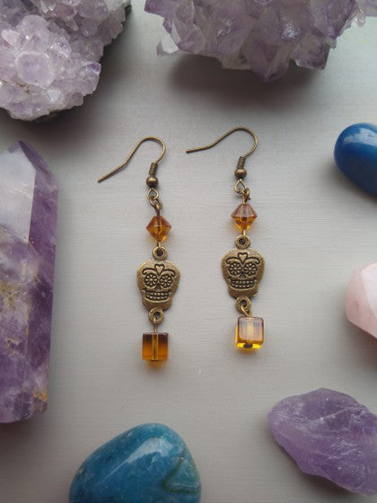ARETES CALAVERITAS COLOR AMBAR