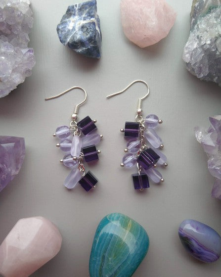 ARETES MORADO CON LILA