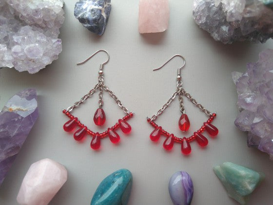 ARETES ROJOS CON GOTAS
