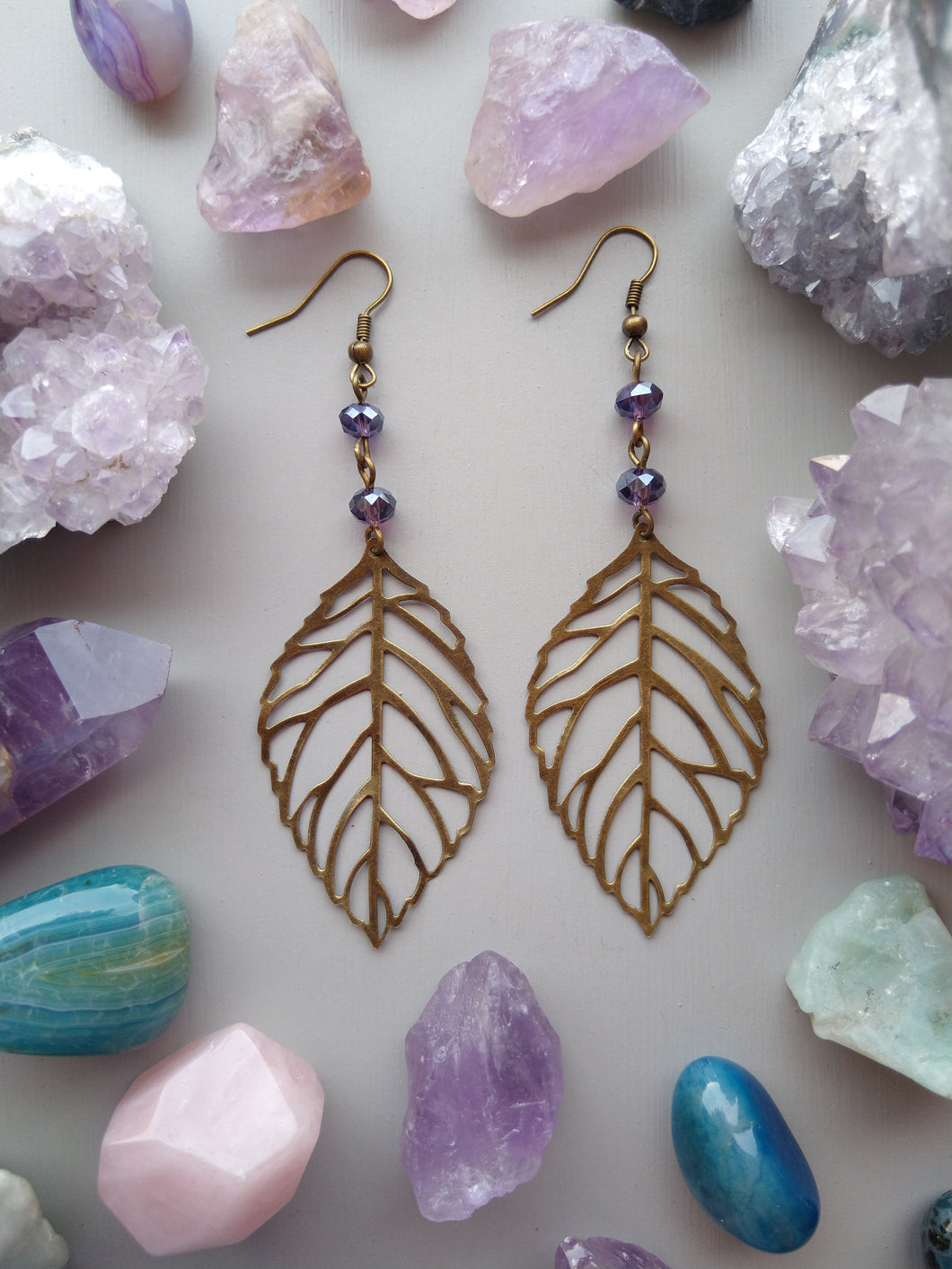 ARETES HOJAS MORADO