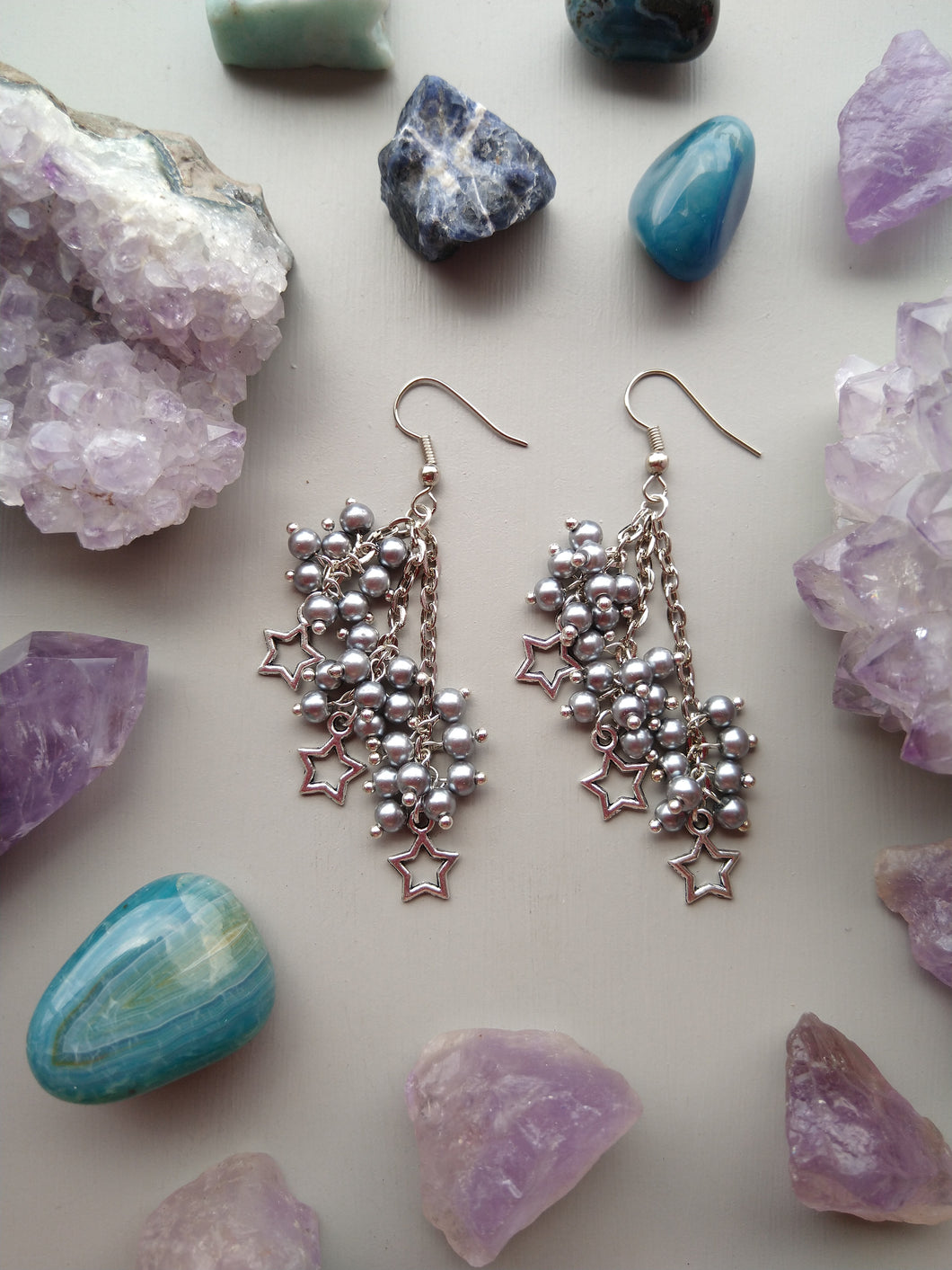 ARETES TRIPLE ESTRELLA PLATEADA