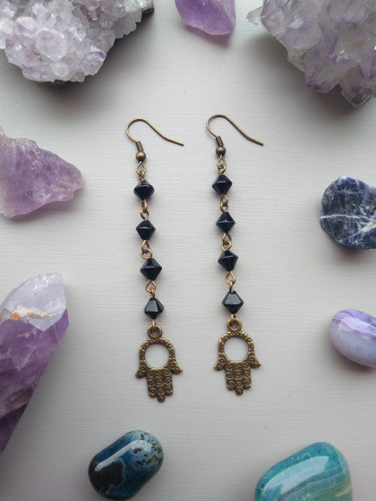 ARETES HAMSA NEGROS