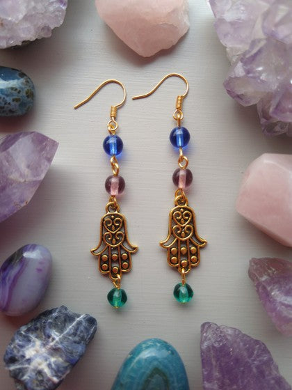 ARETES VERDE, AZUL Y MORADO HAMSA