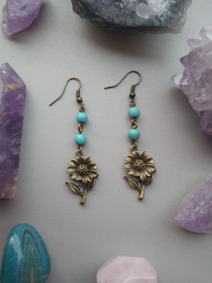 ARETES HOWLITA AZUL GIRASOLES