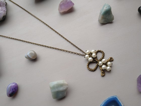 COLLAR MOÑO PERLAS